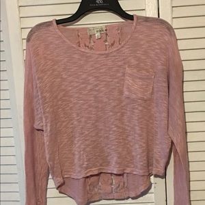 A long sleeved cropped top